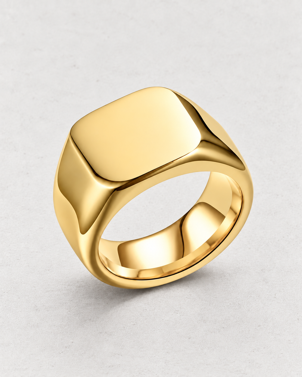PARLX Axis Band rounded-square signet ring in gold tone on light concrete
