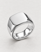 PARLX Axis Band rounded-square signet ring in polished steel on light concrete