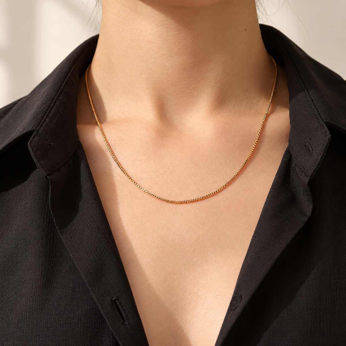 PARLX Box Chain Necklace in warm gold tone — generated on-body styling image