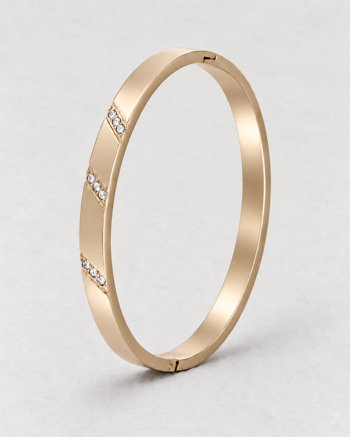 PARLX Channel Cuff in champagne gold tone on light concrete — supplier-referenced rendering