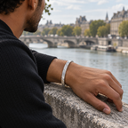 PARLX Channel Cuff in silver steel — generated man beside a city river lifestyle image