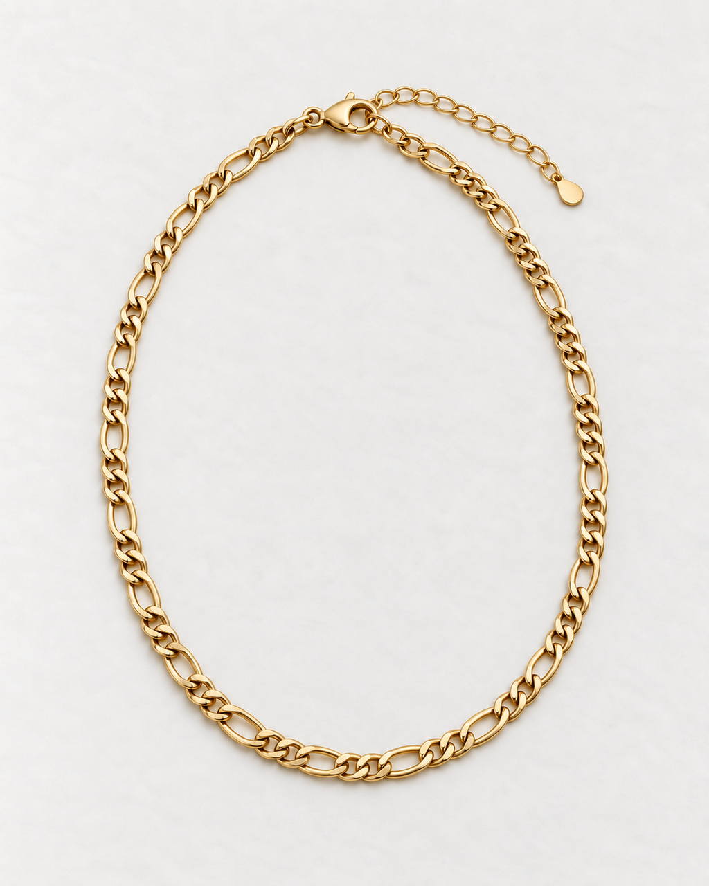 PARLX Figaro Chain Necklace in champagne gold tone on light concrete — existing render with standardized catalog styling