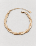 PARLX Intertwined Chain Bracelet in champagne gold tone on light concrete — supplier-referenced rendering