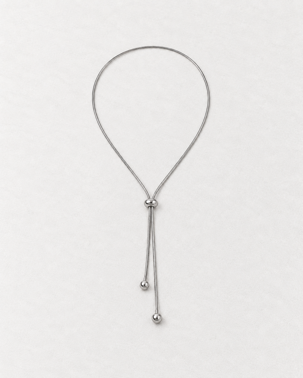 PARLX Adjustable Snake Chain in polished steel on light concrete — supplier-referenced rendering