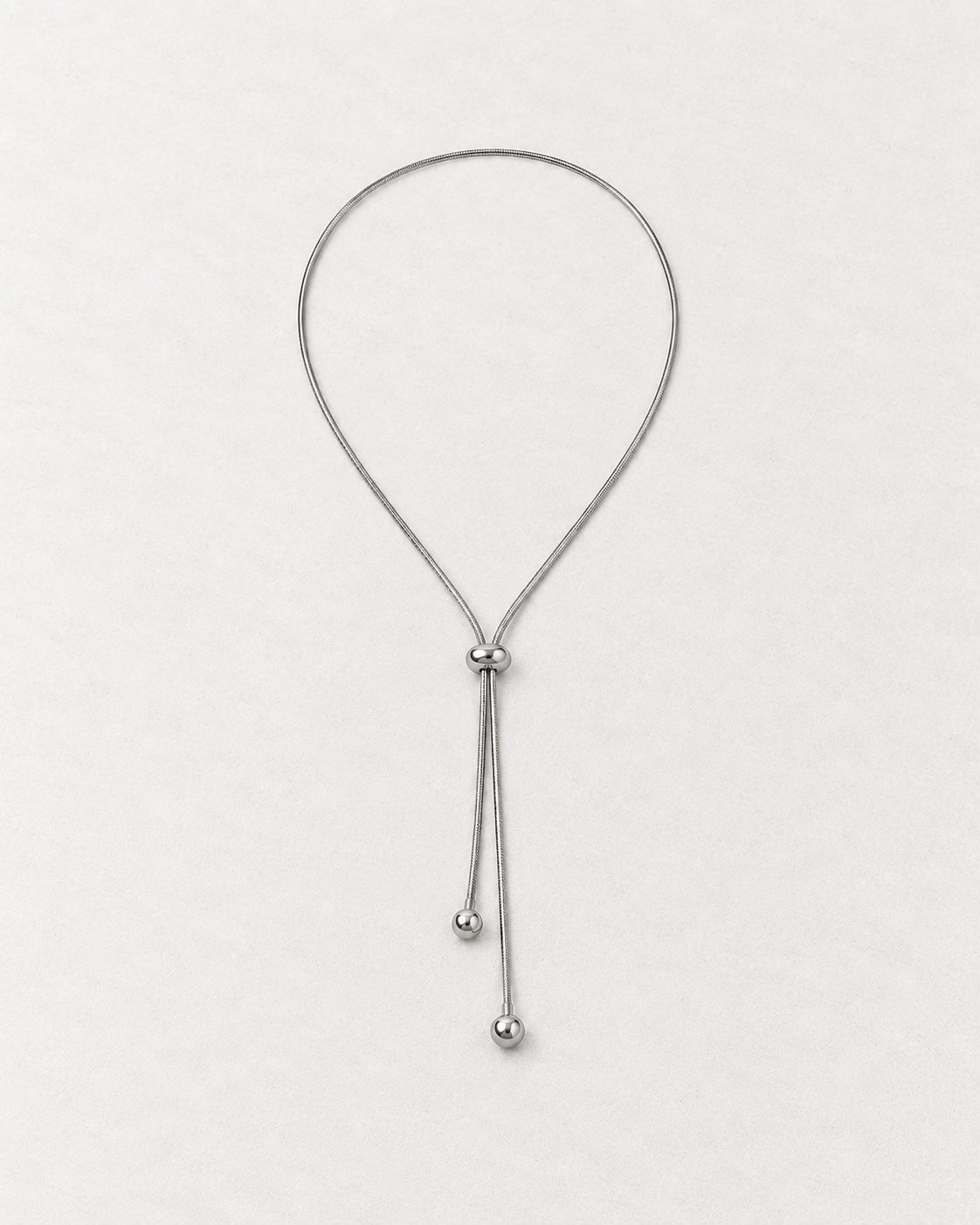 PARLX Adjustable Snake Chain in polished steel on light concrete — supplier-referenced rendering
