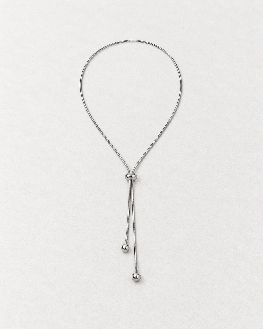PARLX Adjustable Snake Chain in polished steel on light concrete — supplier-referenced rendering