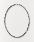 PARLX Twisted Chain Necklace in polished steel on light concrete — existing render with standardized catalog styling