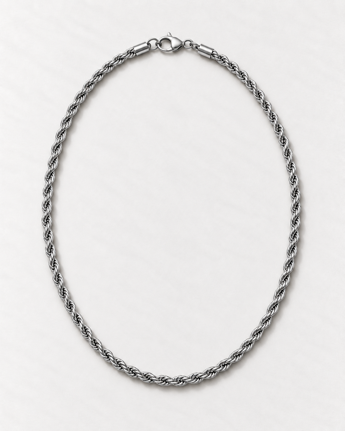 PARLX Twisted Chain Necklace in polished steel on light concrete — existing render with standardized catalog styling